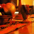 Kwanzukkah includes fruit, along with other food and drinks