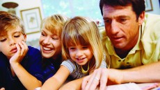 A family working together to make a lifebook