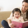 Mother and daughter in their reading routine