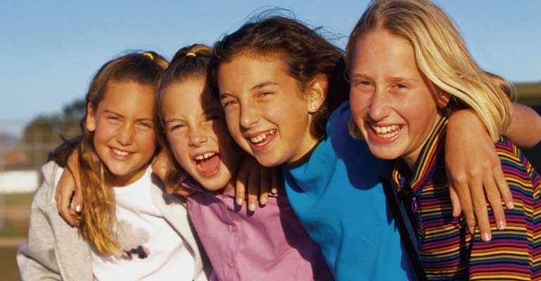 Friendships with other adopted children can help your child feel like she fits in