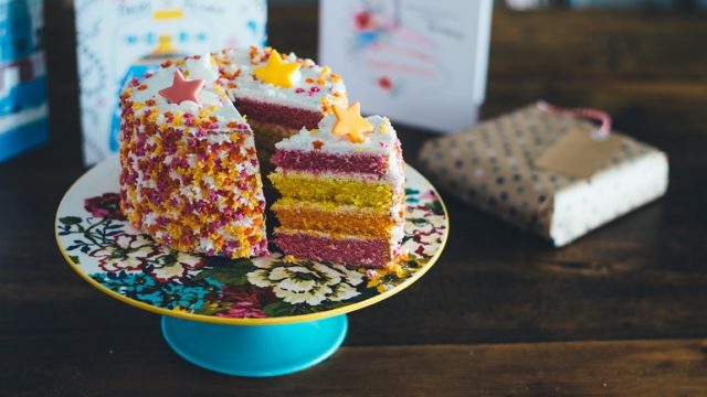 An adoption shower cake and gift