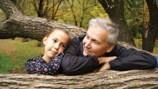 father and daughter talking about adoption outside