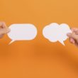 Conversation bubbles representing reader responses to a new sibling