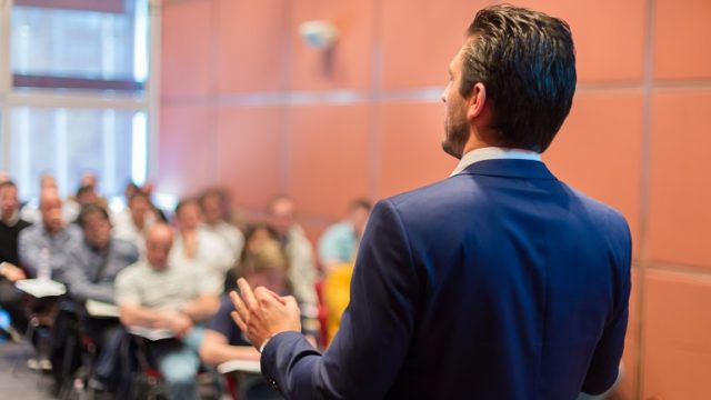 A man teaches an adoption education class