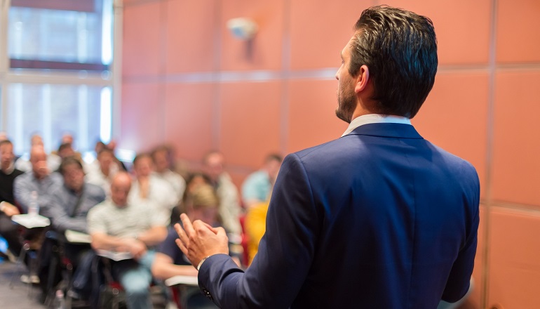 A man teaches an adoption education class