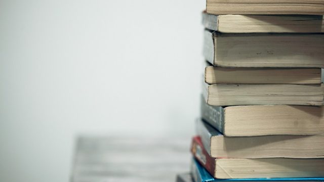 A stack of books the celebrate diversity in multiracial families