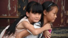 Two Chinese adoptees play