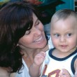 An adoptive mother and her son, a child with disabilities