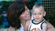 An adoptive mother and her son, a child with disabilities