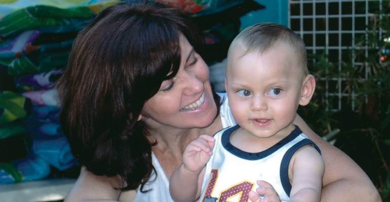 An adoptive mother and her son, a child with disabilities
