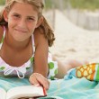 A teenage girl reading books with fictional adopted characters