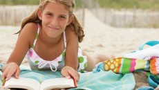 A teenage girl reading books with fictional adopted characters