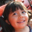 A young girl, brought to America via Honduras adoption