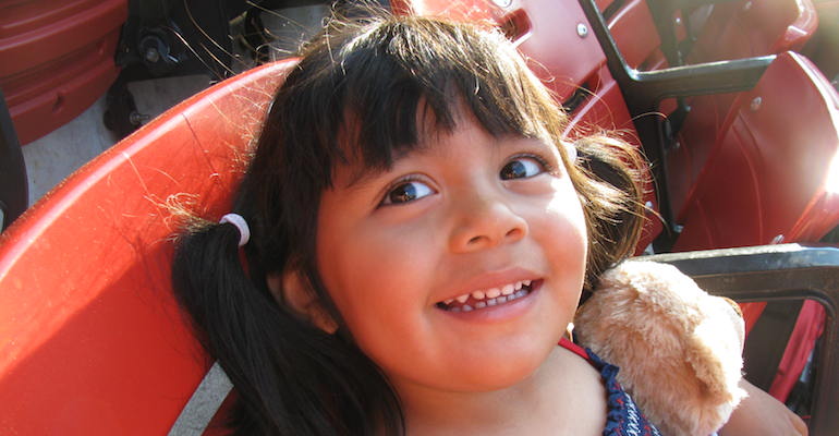 A young girl, brought to America via Honduras adoption