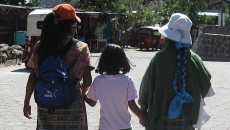 A young Guatemalan adoptee meeting her birth mother and grandmother
