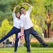 Korean couple preparing for an adoptive wedding