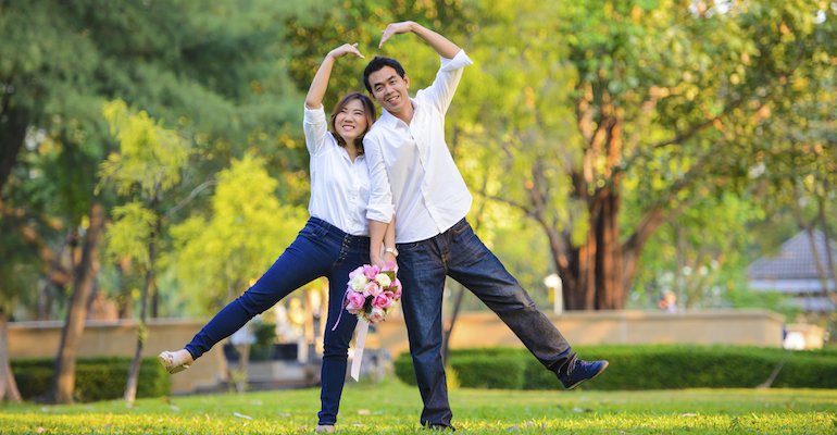 Korean couple preparing for an adoptive wedding