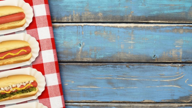 Hot dogs on a picnic table, representing the author's first summer as a mom