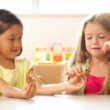 A picky eater shares her school lunch with a friend