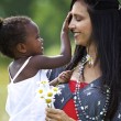 A mother preparing her adopted daughter for questions about racial differences