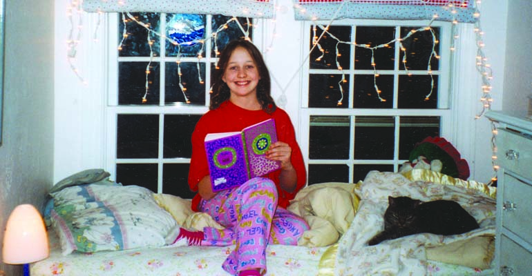 Alexandra, happily overcoming her reading disability