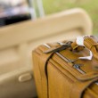 A suitcase filled with necessary items for adoption travel
