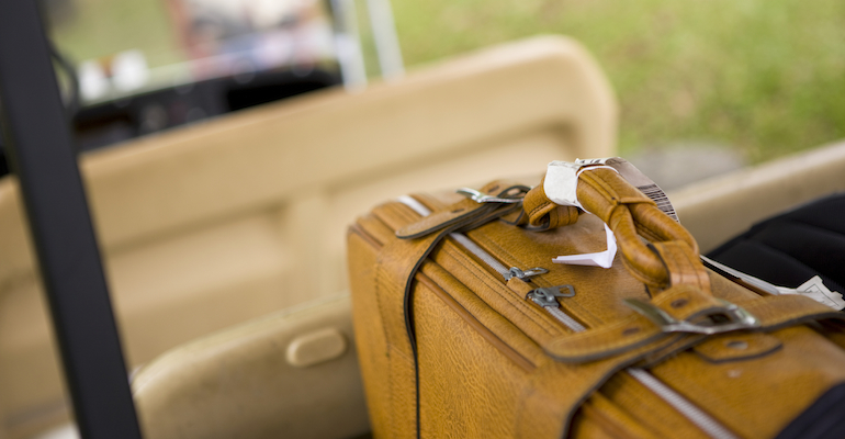 A suitcase filled with necessary items for adoption travel