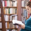 How do birth parents feel about adoption? Represented by a pregnant woman reading a book