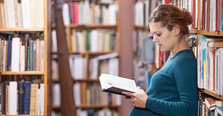 How do birth parents feel about adoption? Represented by a pregnant woman reading a book