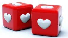 Red dice with hearts for playing Bunko, this author's adoption support group