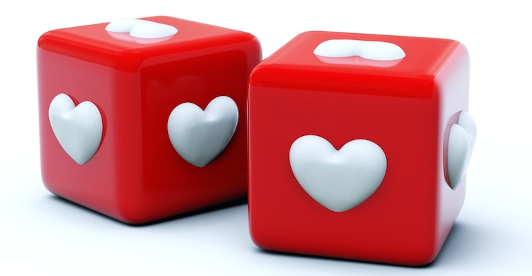 Red dice with hearts for playing Bunko, this author's adoption support group