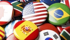 Collection of flag buttons, representing intercountry adoption