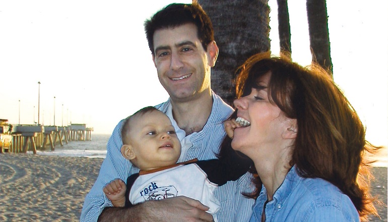 I.D. Steinberg and her husband pose with the son that made them first time parents