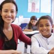 Portrait of a teacher and student who have discussed his adoption story.