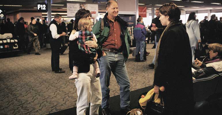 A family in an open adoption waits for the arrival of the birth mother