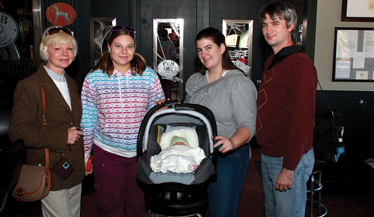 Her daughter's birth family joined her in the hospital