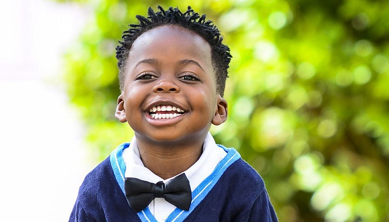 A little boy whose parents taught him about race and racism