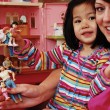 One mother builds a dollhouse family to reflect transracial adoptive families.