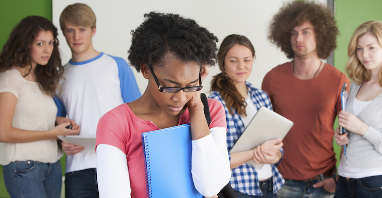 A preteen girl handling racism