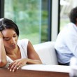 A young woman worried about home study problems