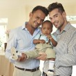 Parents like this happy gay couple talk about becoming a mom or dad after adoption