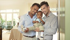 Parents like this happy gay couple talk about becoming a mom or dad after adoption