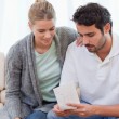 A couple choosing a referral for their adoption