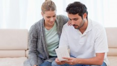 A couple choosing a referral for their adoption