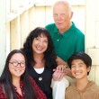 An adoptee and her family, wondering if she should play the adoption card in a college essay