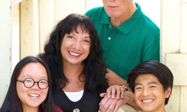 An adoptee and her family, wondering if she should play the adoption card in a college essay