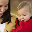 A mother and baby, discussing new state adoption laws