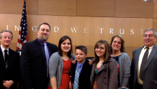 A family in court on their 10-year-old son's adoption day from foster care.