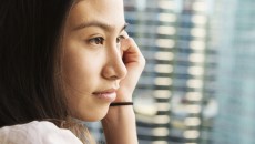 A young woman, thinking after reading Red Thread Sisters