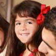 A happy child, whose parents used adoption parenting guides to help raise her